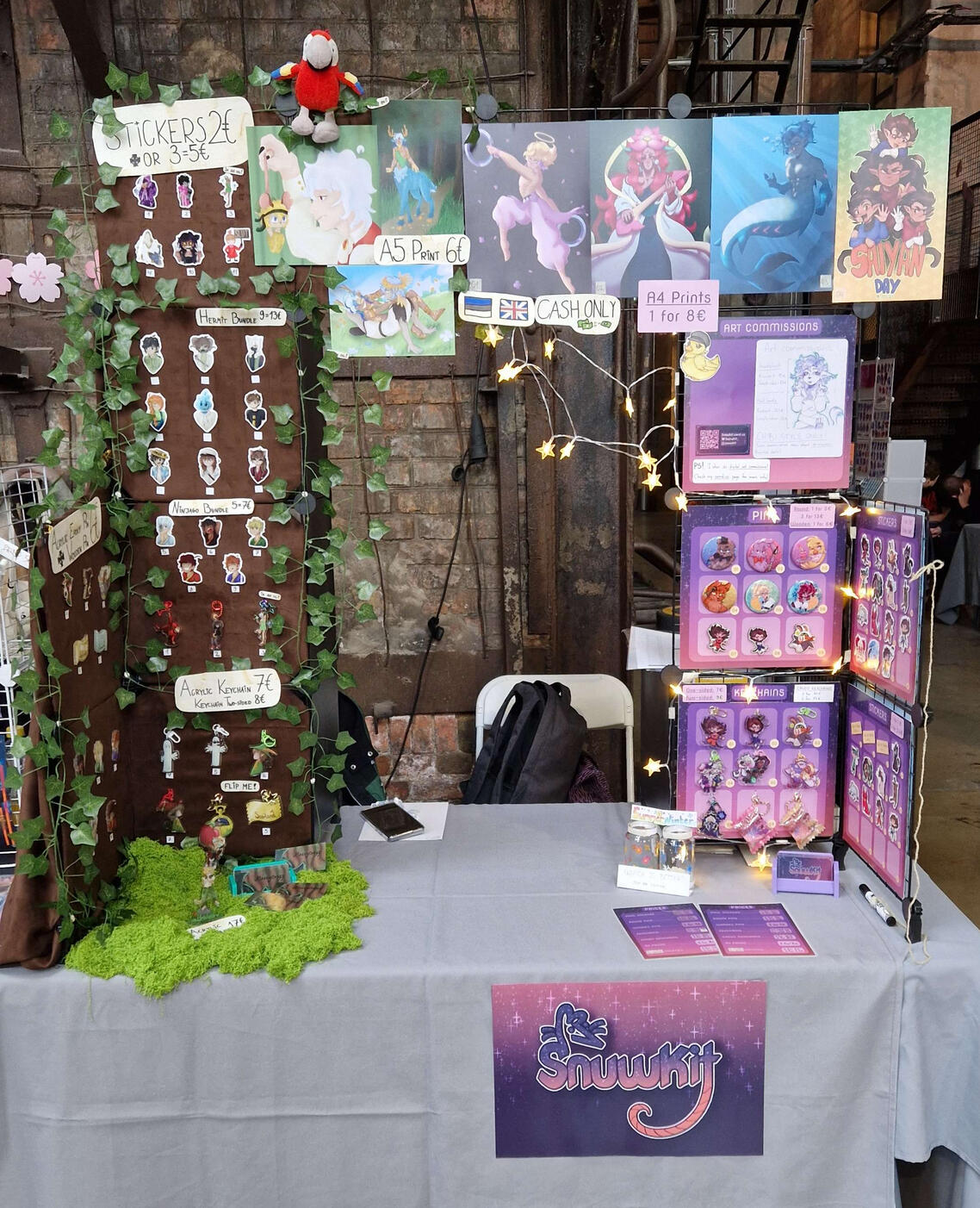 J-Tsoon6 Artist Alley Booth, shared with MossyCrozz